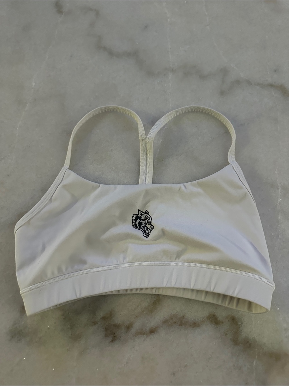 Darc Sport White Racerback Sports Bra with Wolf Logo on front and back
